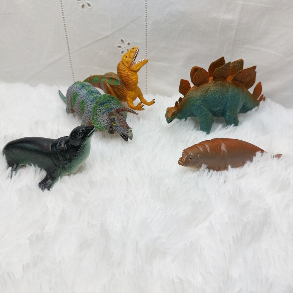 Dinosaur lot of 3 plus Manatee and seal